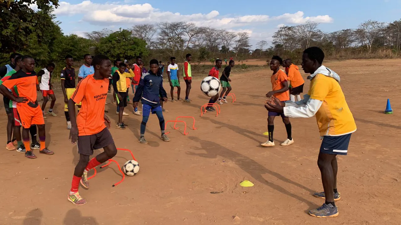 Youth training session in Zambia using our footballs