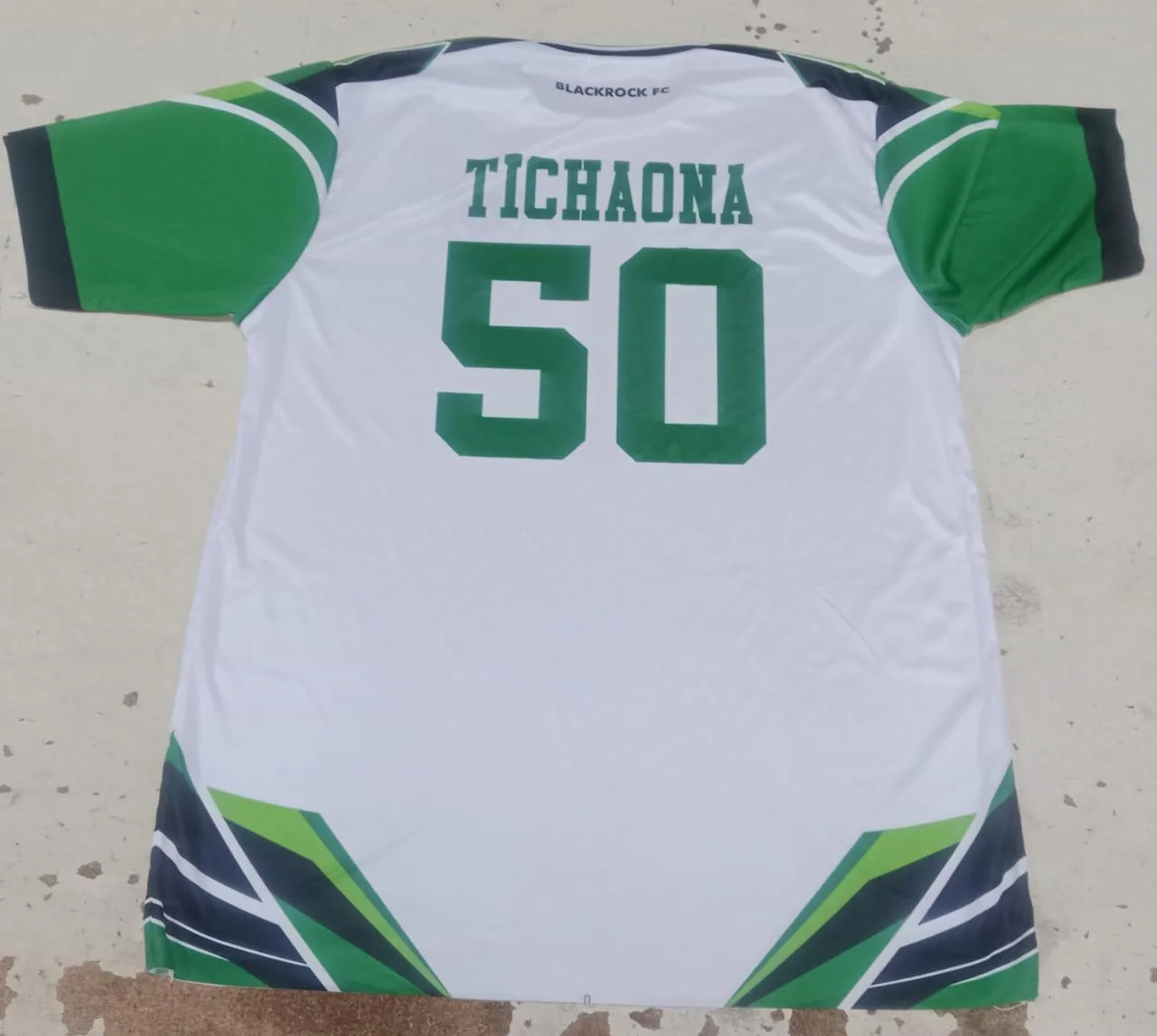 Custom sublimated football shirt with player name and number, made by Star Kick Sports